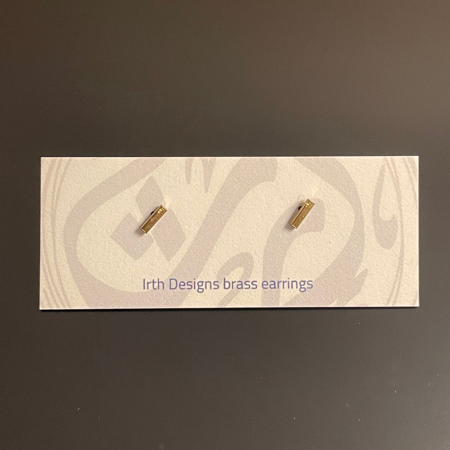 Irth Mini Brass Bar Studs on card