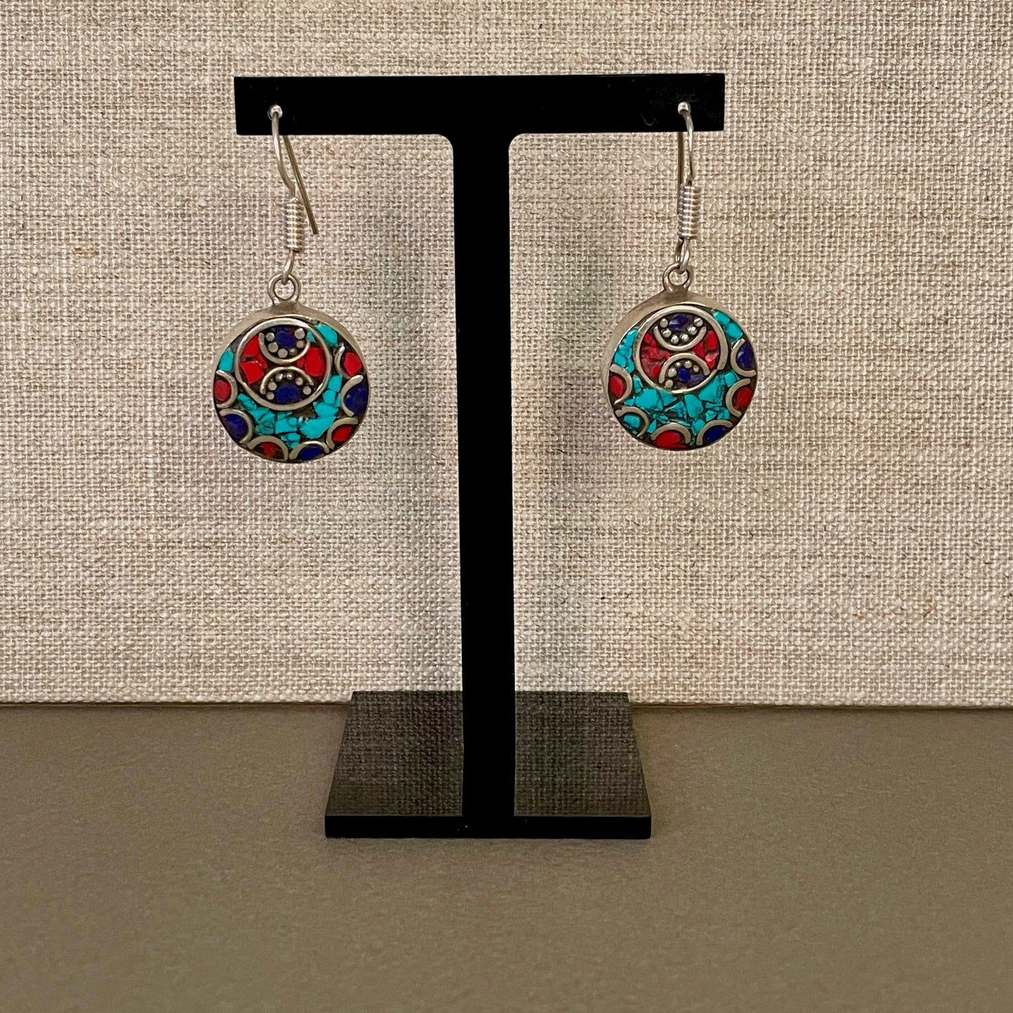 Berber Silver Turquoise & Red Stone Round Earrings on stand