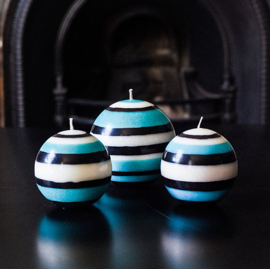 Small Eco Ball Candle in Jet black, Pearl & Honeybird Stripes still life