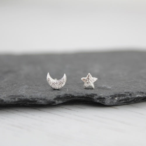 Silver Mismatch Mini Moon and Star Studs by Lucy Kemp