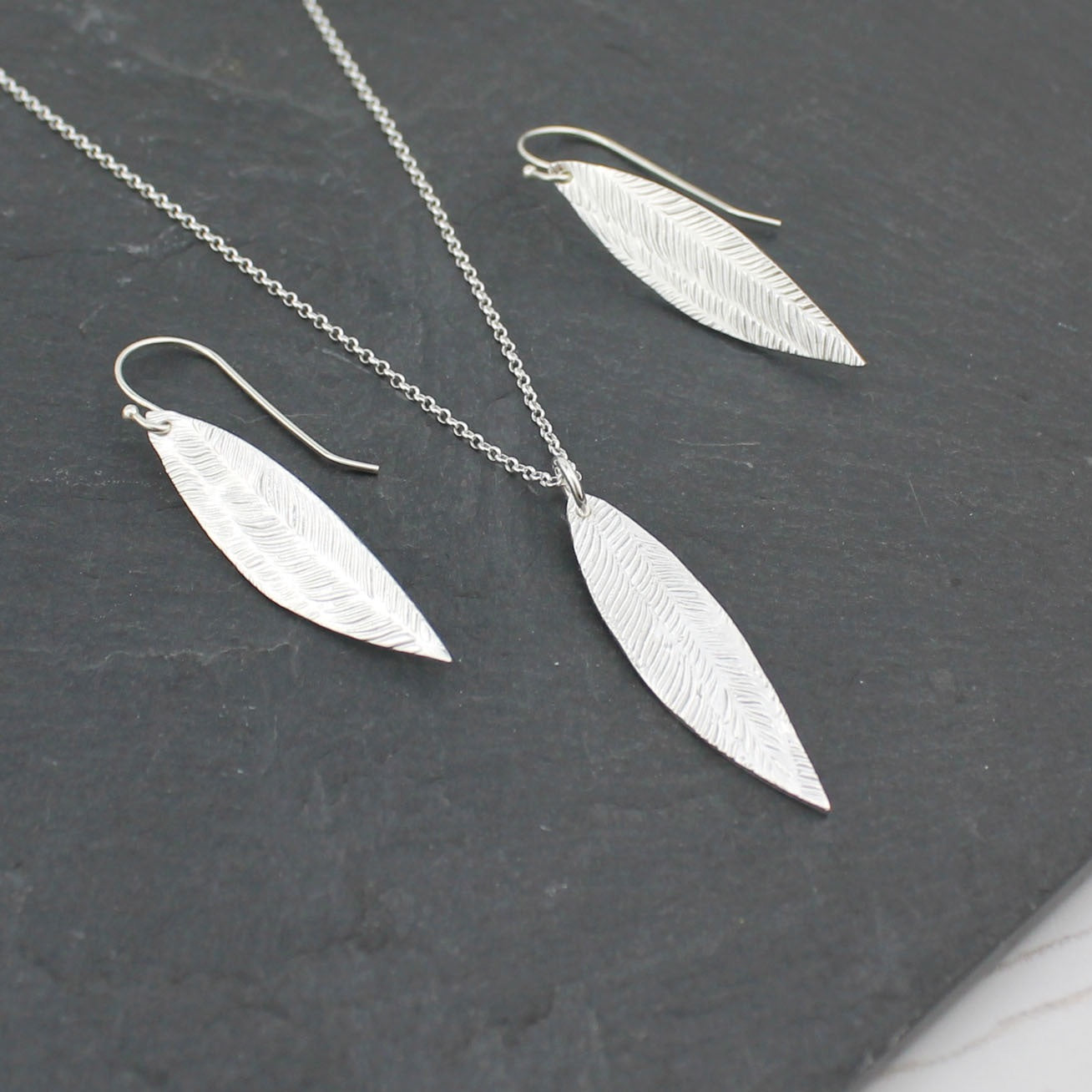 Sterling Silver textured Palm earrings & necklace by Lucy Kemp